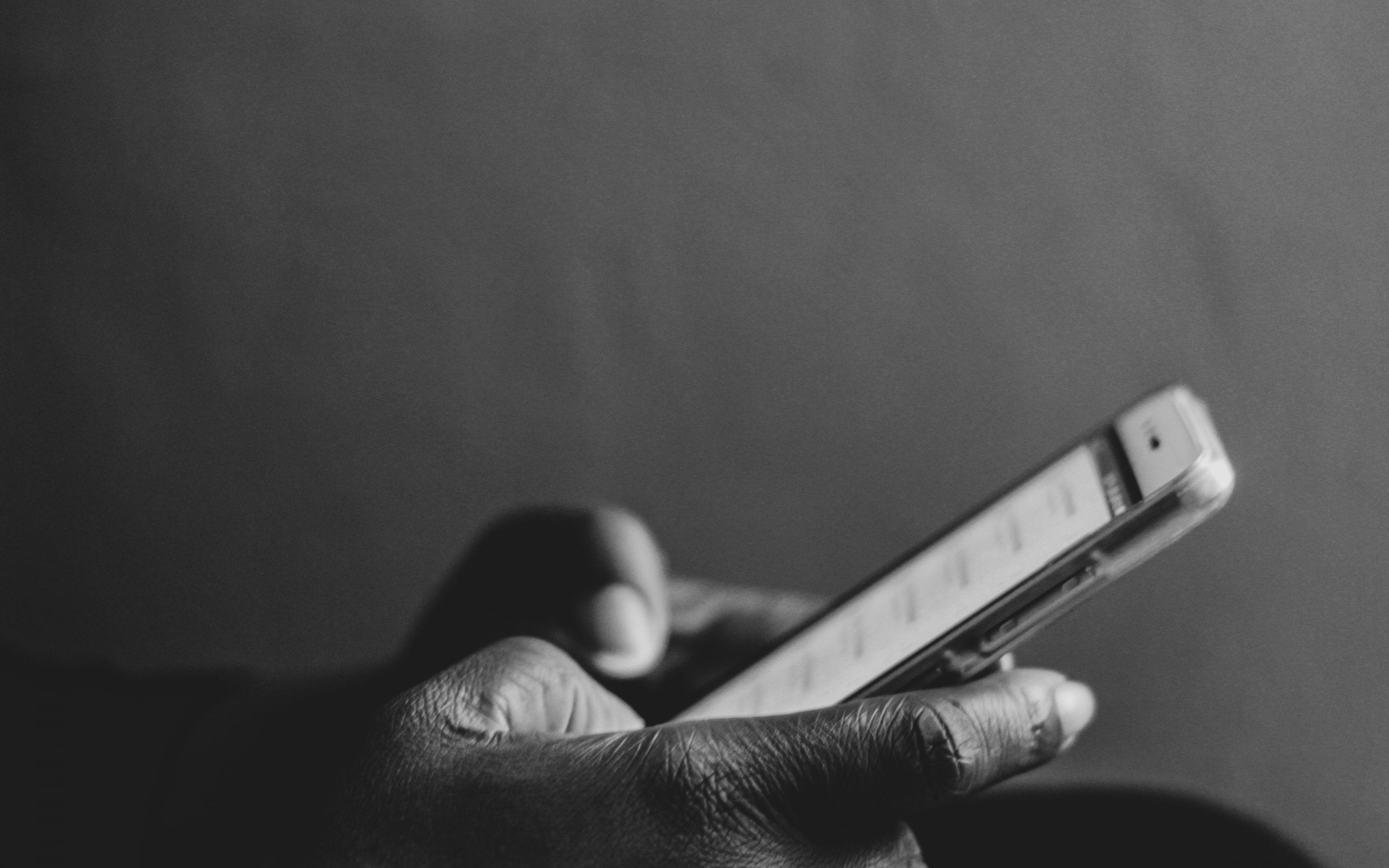 person-using-smartphone-2260237 Phone SIM card swapping